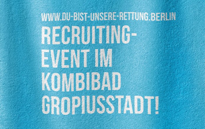 Handtuch mit der Aufschrift: Recruiting-Event im Kombibad Gropiusstadt